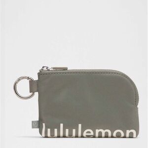 NWT Lululemon Clippable Card Pouch. Color Sage Green/Light Ivory.